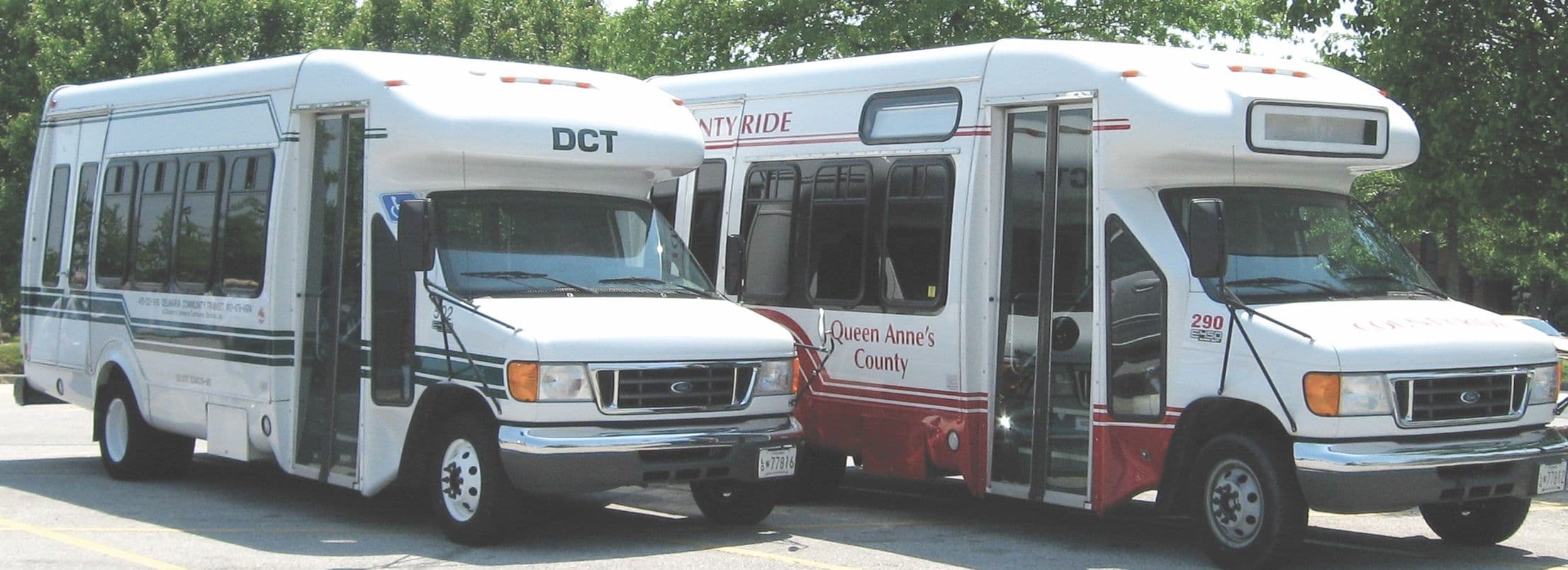 image of two buses